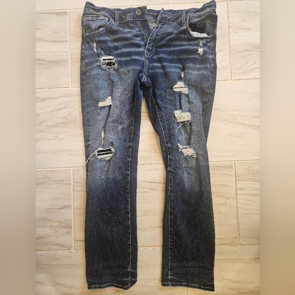Distressed Blue Jeans